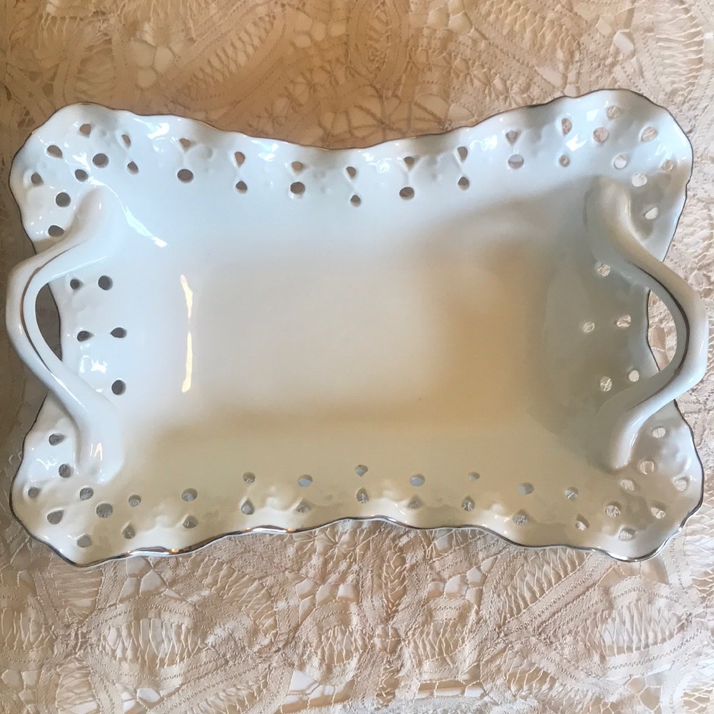 Porcelain basket .. Santino collection.